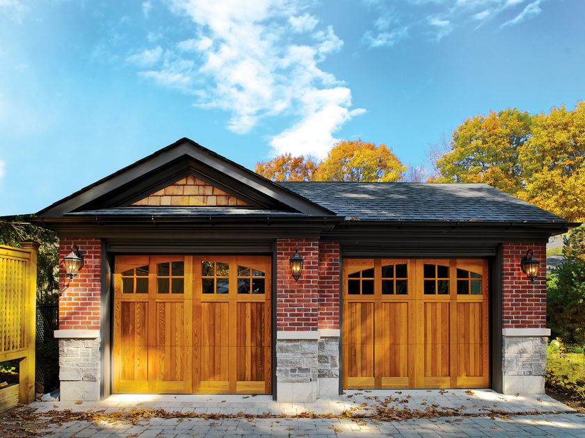 Wood-look garage door on a home exterior